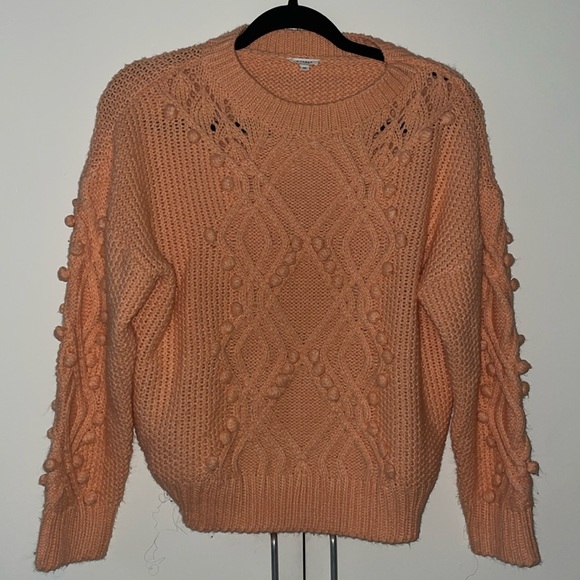 Coral knitted sweater with pom-poms - Picture 1 of 4